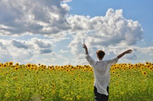 young woman in field